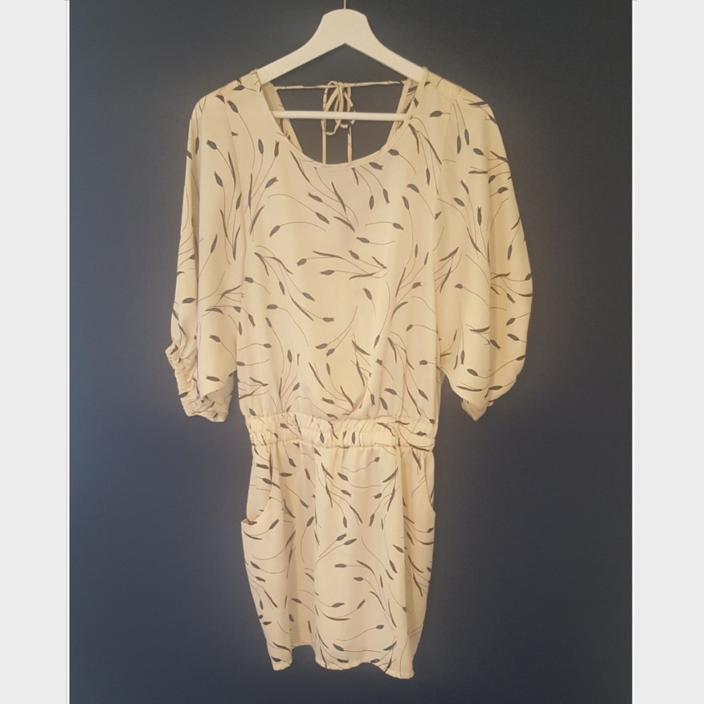 Silky cream dress with blue and teal pattern